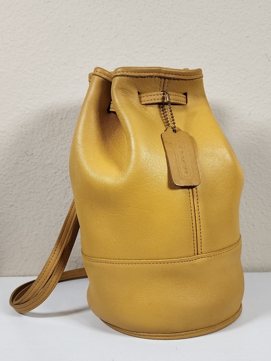 Coach Handbags - Vintage Coach Yellow Bixby Sling #9984